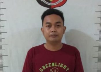 AA (20), relawan rekrutan Dinas Kesehatan Kepulauan Riau. (Foto: Polsek Batam Kota)