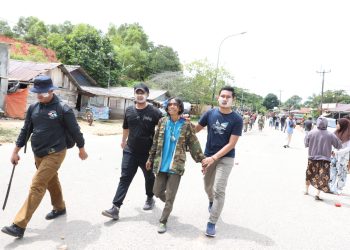 Aparat kepolisian berhasil menangkap oknum provokator yang kedapatan membawa senjata tajam. (Foto : BP Batam)