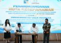 Kepala BP Batam, Amsakar Achmad menandatangani MoU dengan Ombudsman RI. (Foto: Humas BP).